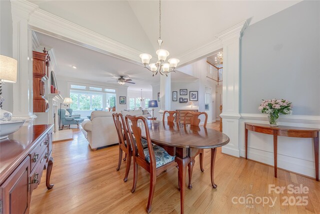 6024 Highview Rd, Weddington, NC 28104 - dining room featuring a chandelier, light wood-type flooring, lofted ceiling, crown molding, and ceiling fan