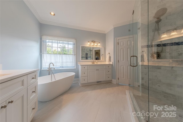 6024 Highview Rd, Weddington, NC 28104 - bathroom with a stall shower, crown molding, a freestanding tub, two vanities, and recessed lighting
