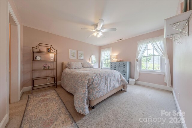 6024 Highview Rd, Weddington, NC 28104 - carpeted bedroom featuring baseboards and a ceiling fan