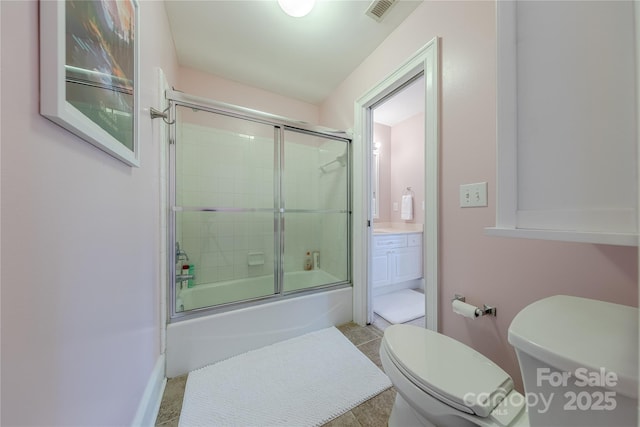 6024 Highview Rd, Weddington, NC 28104 - bathroom featuring toilet, combined bath / shower with glass door, tile patterned flooring, vanity, and baseboards