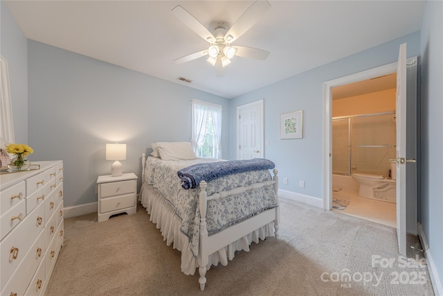 6024 Highview Rd, Weddington, NC 28104 - bedroom with light carpet, baseboards, ensuite bath, and a ceiling fan