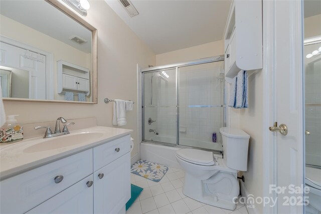 6024 Highview Rd, Weddington, NC 28104 - bathroom featuring toilet, tile patterned flooring, vanity, and bath / shower combo with glass door