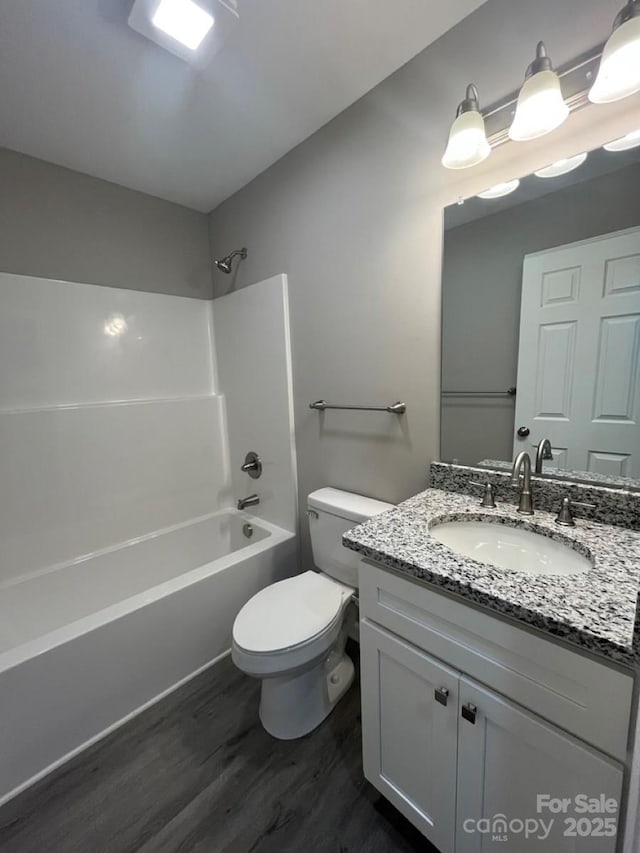1024 Short St, Salisbury, NC 28144 - full bath with wood finished floors, vanity, and bathing tub / shower combination