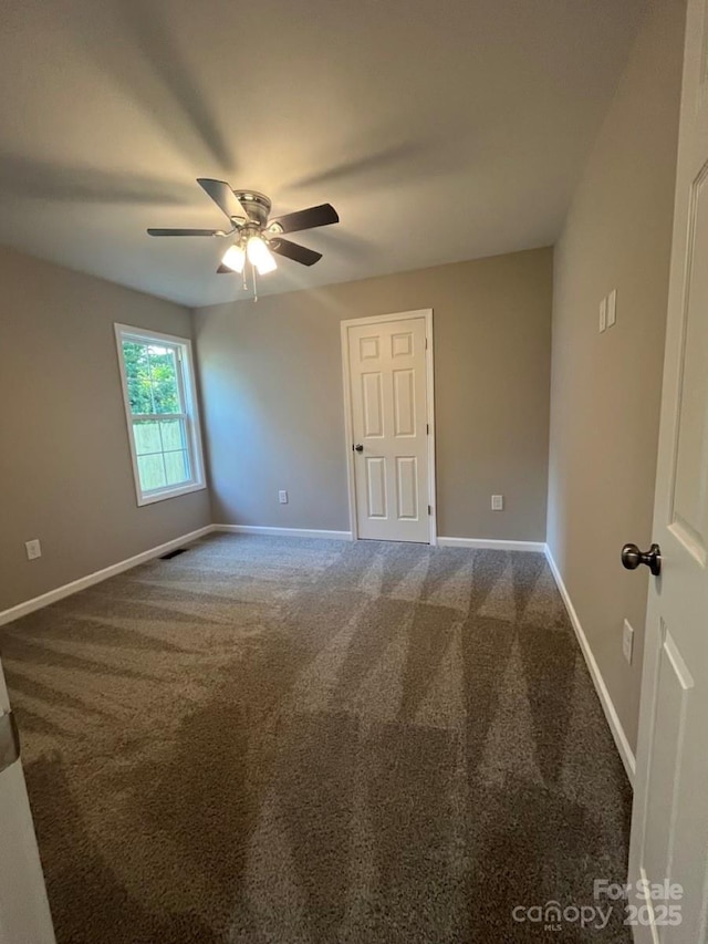 1024 Short St, Salisbury, NC 28144 - empty room with ceiling fan and carpet flooring