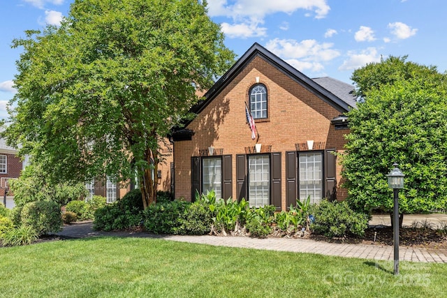 9625 Donna Ve Ln, Charlotte, NC 28277 - view of front facade featuring brick siding and a front lawn