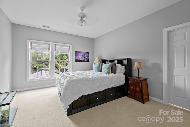 9625 Donna Ve Ln, Charlotte, NC 28277 - bedroom with carpet flooring, baseboards, and a ceiling fan