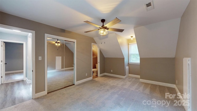 8905 Vagabond Rd, Mint Hill, NC 28227 - additional living space with a ceiling fan, carpet, vaulted ceiling, and baseboards