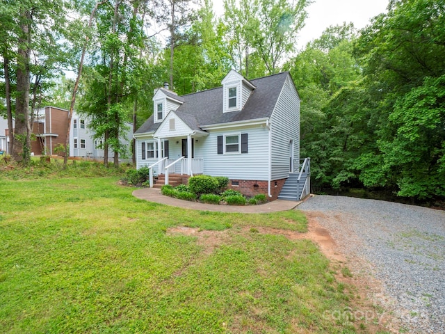 8905 Vagabond Rd, Mint Hill, NC 28227 - cape cod home featuring a front lawn, roof with shingles, driveway, and crawl space