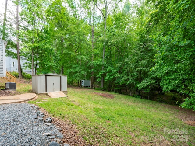 8905 Vagabond Rd, Mint Hill, NC 28227 - view of green lawn featuring a shed, an outdoor structure, and cooling unit