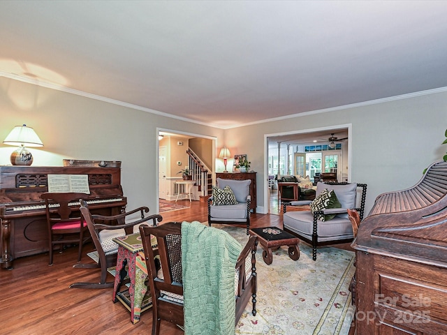 4951 Dayspring Dr, Mint Hill, NC 28227 - living area featuring stairway, crown molding, and wood finished floors