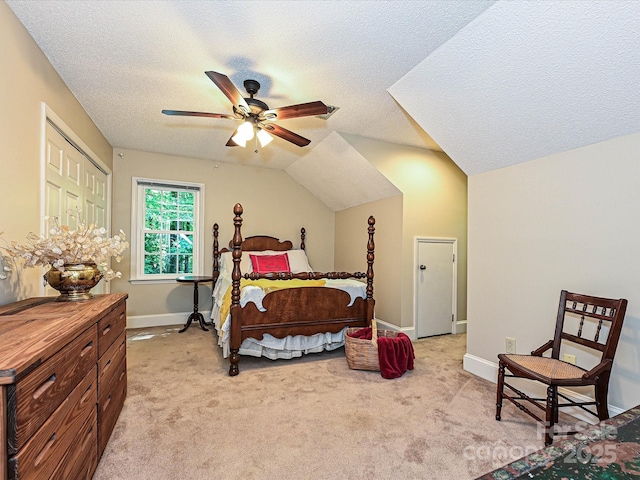 4951 Dayspring Dr, Mint Hill, NC 28227 - bedroom featuring a textured ceiling, vaulted ceiling, light colored carpet, baseboards, and a ceiling fan