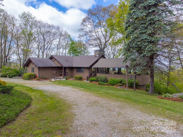5271 Big Ridge Rd, Glenville, NC 28736 - ranch-style house featuring a chimney, a front lawn, roof with shingles, and covered porch