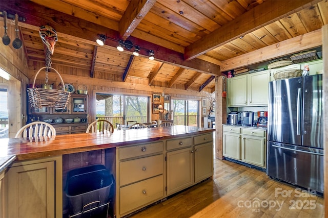 5271 Big Ridge Rd, Glenville, NC 28736 - kitchen with freestanding refrigerator, butcher block countertops, wooden ceiling, wood finished floors, and green cabinets