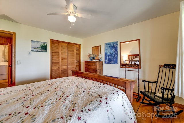 5271 Big Ridge Rd, Glenville, NC 28736 - bedroom with wood finished floors, a closet, ceiling fan, and washer / clothes dryer