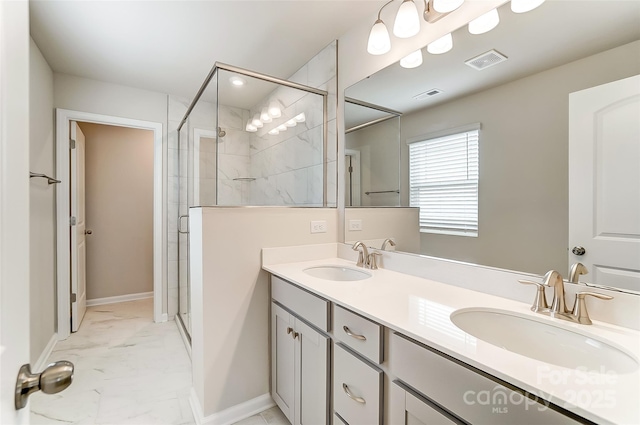 full bath with a shower stall, marble look tiles, double vanity, and baseboards