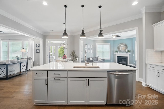 220 Forsythia Ln, Tega Cay, SC 29708 - kitchen featuring stainless steel dishwasher, a sink, open floor plan, light countertops, and ceiling fan
