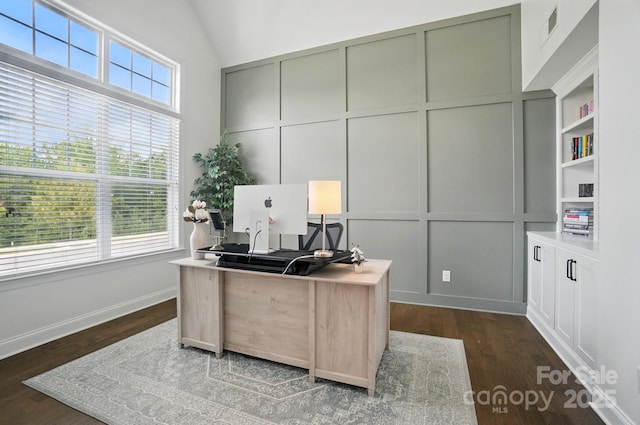 220 Forsythia Ln, Tega Cay, SC 29708 - office area with dark wood-style flooring, a decorative wall, vaulted ceiling, and baseboards