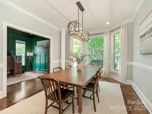 dining area with crown molding, wood finished floors, a chandelier, an office area, and recessed lighting