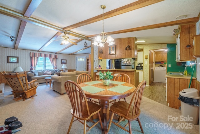 2310 Alexis Lucia Rd, Stanley, NC 28164 - dining space with washer / dryer, wallpapered walls, light carpet, beam ceiling, and a ceiling fan