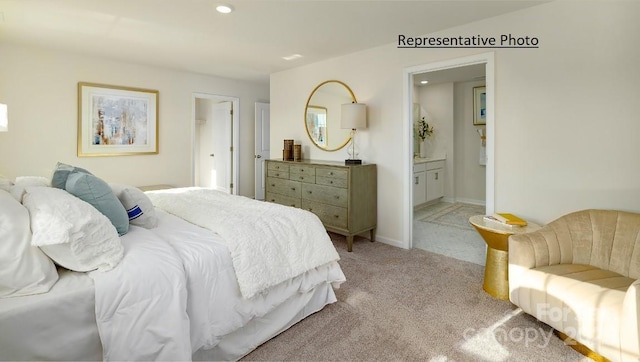 1415 5th Street Dr NE, Hickory, NC 28601 - bedroom featuring light colored carpet, recessed lighting, and ensuite bath