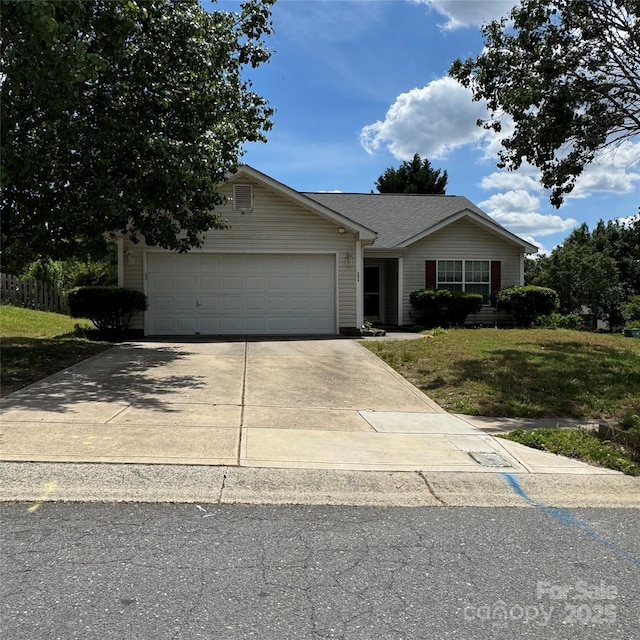 3012 Longspur Dr, Matthews, NC 28105 - view of front facade featuring a front yard, a garage, and concrete driveway
