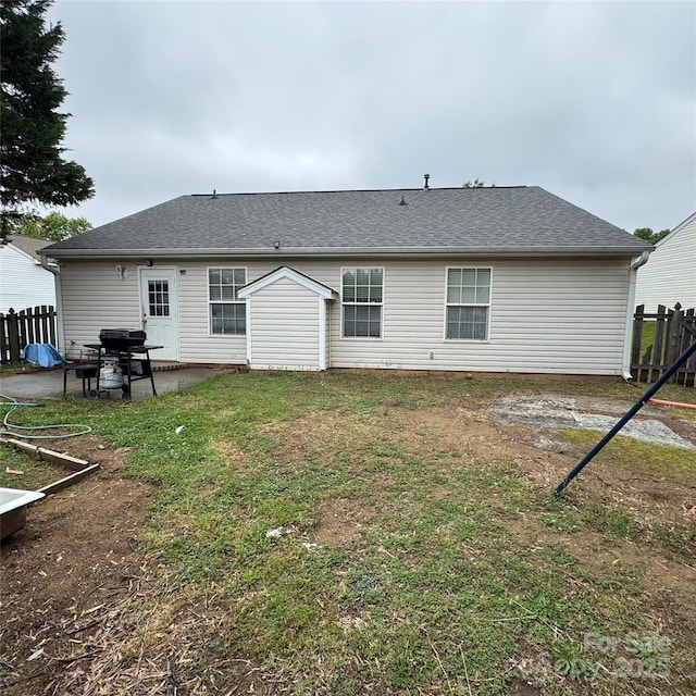 3012 Longspur Dr, Matthews, NC 28105 - rear view of house with a patio area