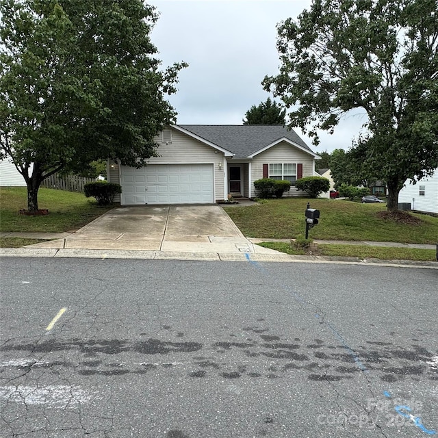 3012 Longspur Dr, Matthews, NC 28105 - single story home with a garage, driveway, and a front lawn