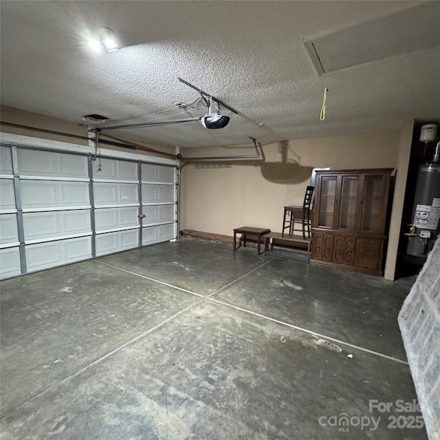 3012 Longspur Dr, Matthews, NC 28105 - garage with water heater and a garage door opener