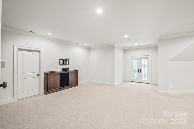 18843 Flat Shoals Dr, Cornelius, NC 28031 - basement with recessed lighting, baseboards, light colored carpet, ornamental molding, and french doors