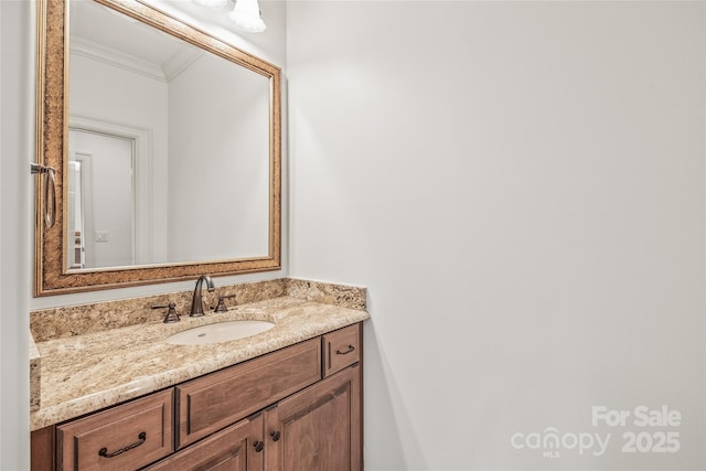 18843 Flat Shoals Dr, Cornelius, NC 28031 - bathroom featuring crown molding and vanity