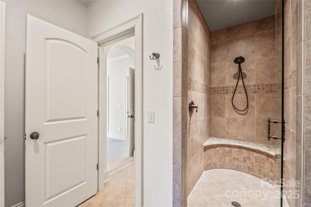 18843 Flat Shoals Dr, Cornelius, NC 28031 - bathroom featuring a tile shower and tile patterned floors