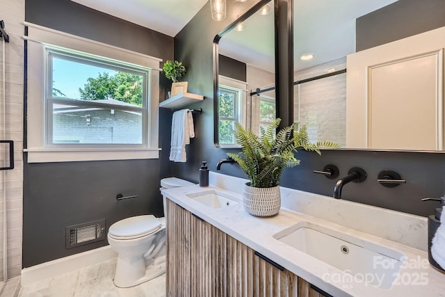1515 Edgewater Dr, Charlotte, NC 28210 - full bath featuring toilet, a shower stall, and double vanity