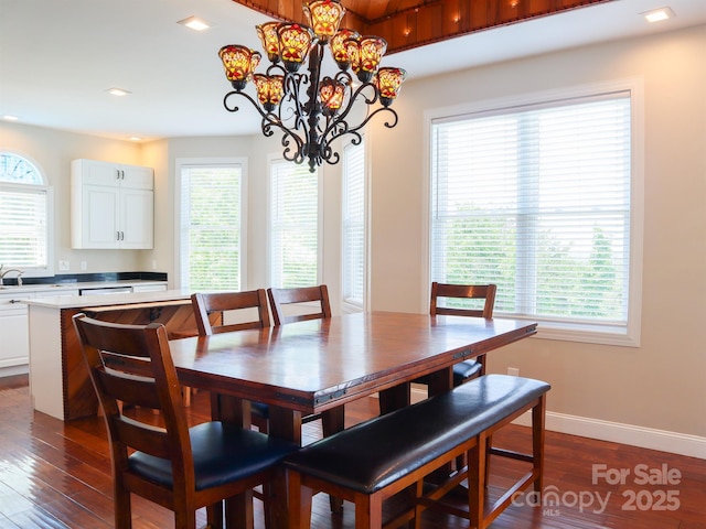 7768 Pinecone Ln, Hickory, NC 28602 - dining room featuring dark wood-type flooring, a chandelier, baseboards, and recessed lighting