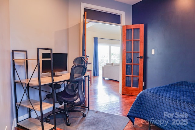 7768 Pinecone Ln, Hickory, NC 28602 - bedroom with wood finished floors and a desk
