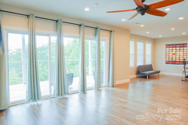 7768 Pinecone Ln, Hickory, NC 28602 - unfurnished room with baseboards, healthy amount of natural light, recessed lighting, and light wood finished floors