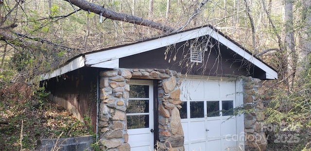31 Samuel Ln, Candler, NC 28715 - view of outdoor structure featuring an outbuilding and a forest view
