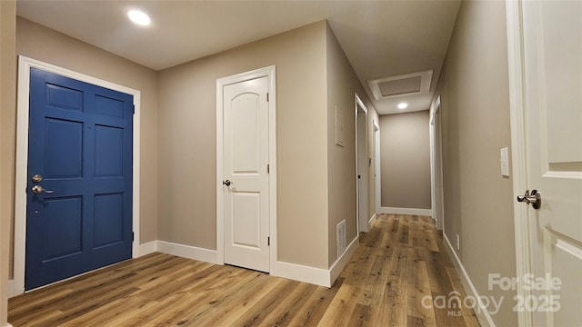 7021 Linda Lake Dr, Charlotte, NC 28215 - foyer featuring light wood-type flooring, baseboards, and recessed lighting
