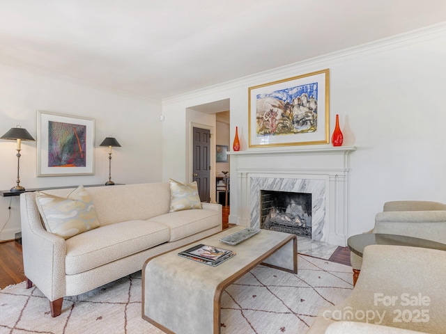 2410 Vernon Dr, Charlotte, NC 28211 - living room with ornamental molding, wood finished floors, and a fireplace