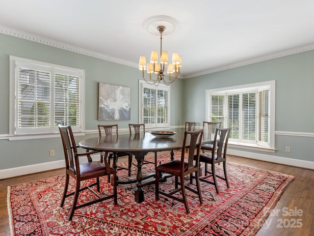 2410 Vernon Dr, Charlotte, NC 28211 - dining room with a chandelier, ornamental molding, and wood finished floors