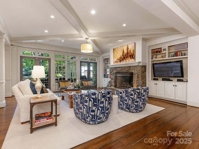 2410 Vernon Dr, Charlotte, NC 28211 - living area with hardwood / wood-style flooring, crown molding, plenty of natural light, beamed ceiling, and a fireplace