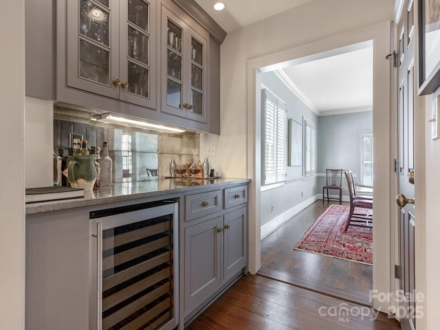 2410 Vernon Dr, Charlotte, NC 28211 - indoor bar with beverage cooler, dark wood finished floors, crown molding, decorative backsplash, and recessed lighting