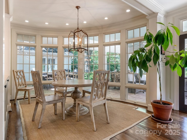 2410 Vernon Dr, Charlotte, NC 28211 - dining space featuring crown molding, healthy amount of natural light, hardwood / wood-style flooring, a chandelier, and recessed lighting