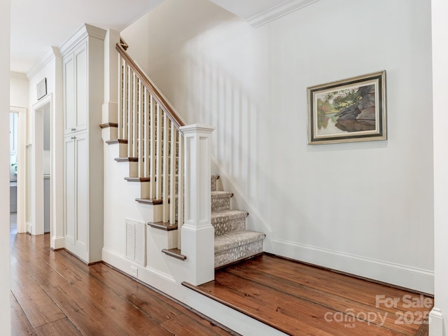 2410 Vernon Dr, Charlotte, NC 28211 - stairs with hardwood / wood-style floors and ornamental molding