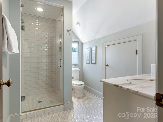 2410 Vernon Dr, Charlotte, NC 28211 - bathroom featuring a stall shower, vanity, lofted ceiling, and tile patterned flooring