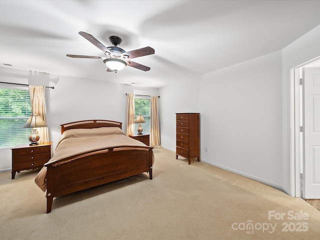 2306 Nettleton Ct, Matthews, NC 28105 - bedroom featuring light carpet, baseboards, and a ceiling fan