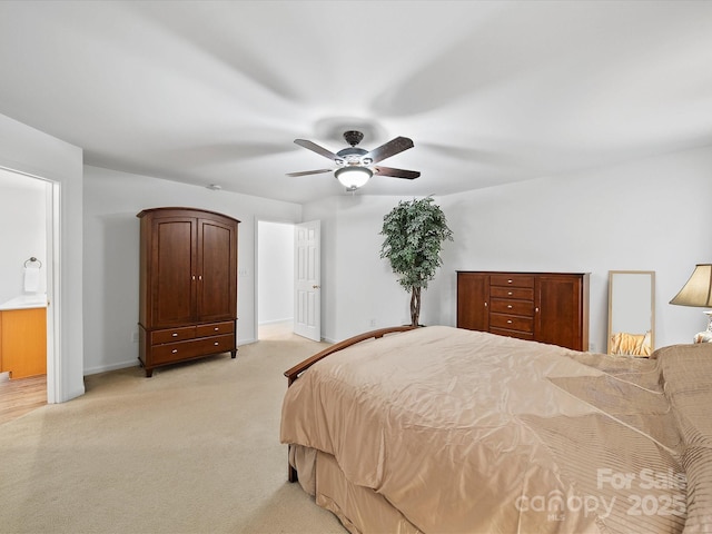 2306 Nettleton Ct, Matthews, NC 28105 - bedroom with light carpet, a ceiling fan, baseboards, and ensuite bath