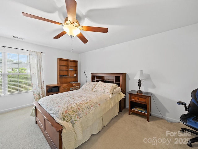2306 Nettleton Ct, Matthews, NC 28105 - bedroom featuring light colored carpet, baseboards, and ceiling fan