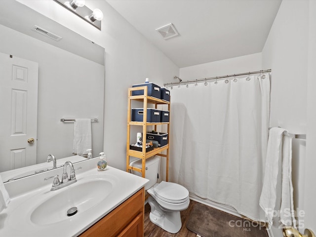 2306 Nettleton Ct, Matthews, NC 28105 - full bathroom featuring toilet, a shower with shower curtain, vanity, and wood finished floors