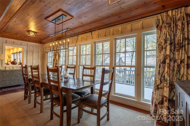 973 Sitting Rock Trl, Cullowhee, NC 28723 - dining room featuring wood ceiling, wood finished floors, and a chandelier