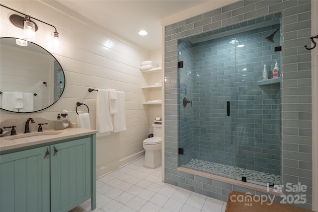 973 Sitting Rock Trl, Cullowhee, NC 28723 - bathroom featuring tile patterned floors, a stall shower, vanity, and toilet